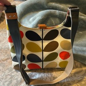 Orla Kiely coated cotton mini sling crossbody bag.